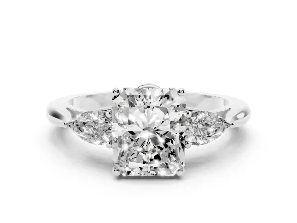 Three-Stone Radiant Cut Diamond Ring with Pear Side Stones in Four-Prong Setting Platinum