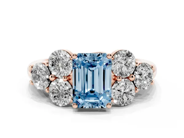 Fancy Blue Emerald Cut Cut Diamond Cluster Ring with Round Accent Stones and Prong Setting on a Classic Band Rose gold