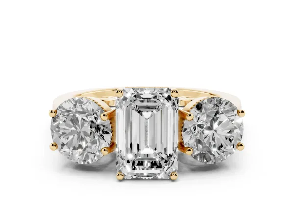 Three-Stone Emerald Cut Diamond Engagement Ring with Prong Setting on a Classic Band Yellow gold