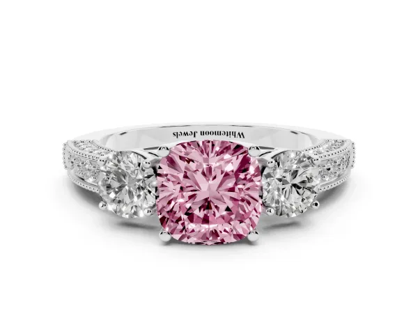 Fancy Pink Cushion Cut Three-Stone Diamond Ring with Pavé Band and Four-Prong Setting Platinum