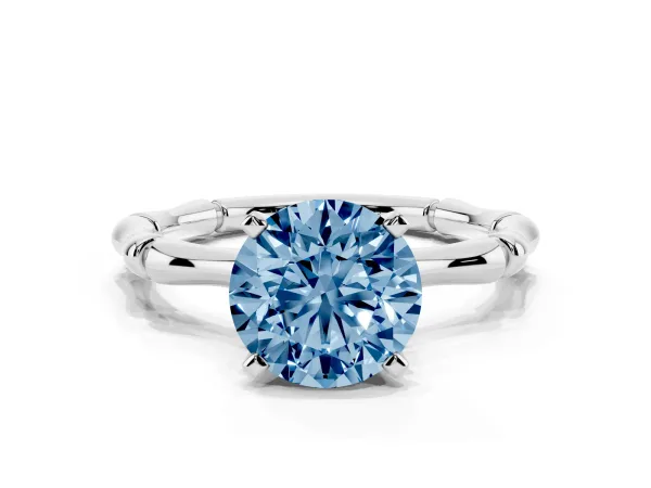 Fancy Blue Round Cut Solitaire Diamond Ring with Bamboo Band and Four-Prong Setting Platinum