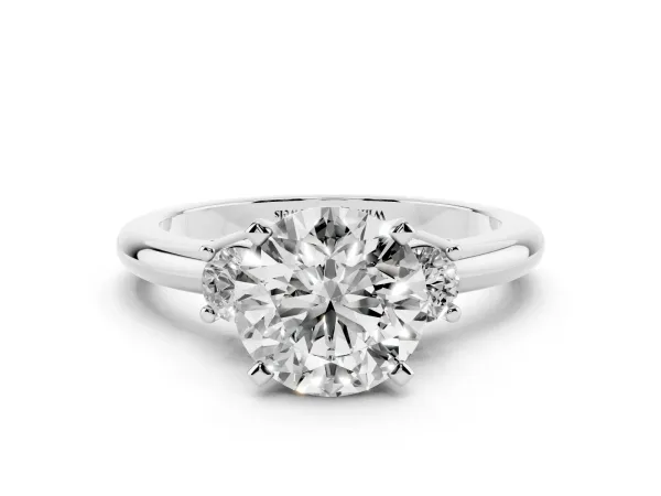 Three-Stone Round Cut Cut Diamond Solitaire with Prong Setting and Classic Band White gold