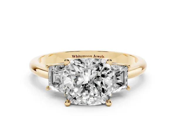 Cushion Cut Diamond Three-Stone Ring with Trapezoid Side Stones and Prong Setting Yellow gold
