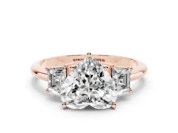 Heart Cut Diamond Three-Stone Ring with Trapezoid Side Stones and Prong Setting Rose gold