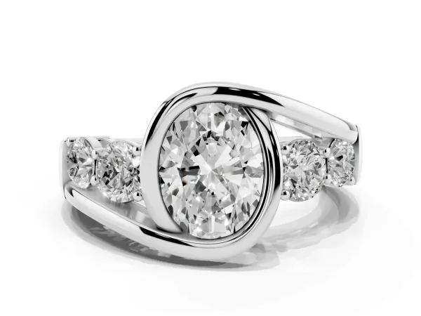 Bezel Set Oval Cut Diamond Bypass Ring with Round Accents Platinum