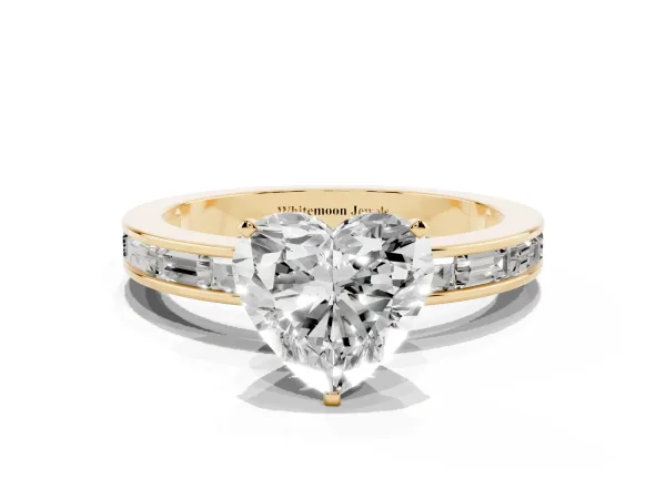 Heart Cut Solitaire Diamond Ring with Channel-Set Baguette Band and Four-Prong Setting Yellow gold