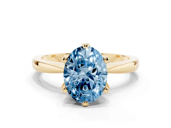 Fancy Blue Oval Cut Solitaire Engagement Ring with Six-Prong Setting and Tapered Band Yellow gold