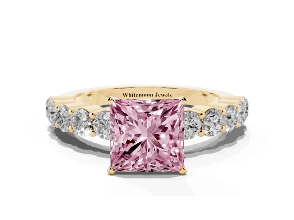 Fancy Pink Princess Cut Diamond Solitaire Ring with Shared Prong Round Side Stones Yellow gold