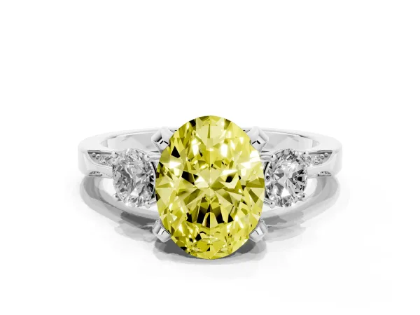 Fancy Yellow Oval Cut Brilliant Three-Stone Diamond Ring with Pavé Band and Four-Prong Setting Platinum