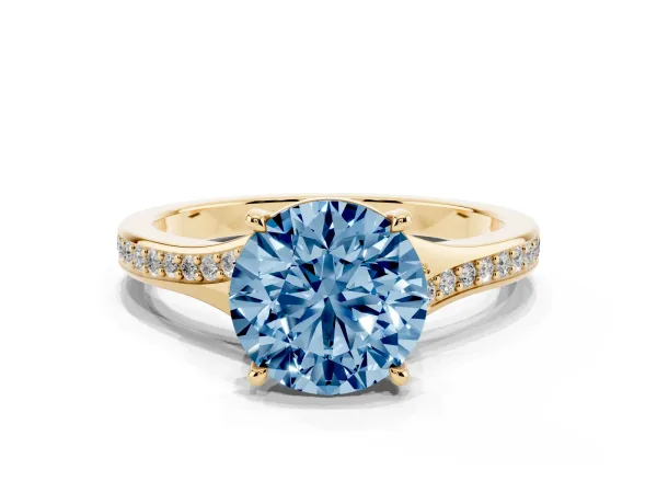 Fancy Blue Round Cut Diamond Solitaire Ring with Pavé Band and Prong Setting Yellow gold