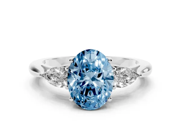 Fancy Blue Oval Cut Diamond Three-Stone Ring with Pear Side Stones and Prong Setting Platinum