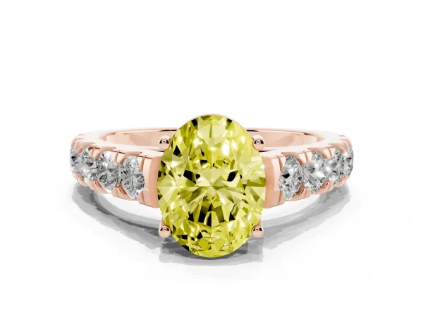 Fancy Yellow Oval Cut Cut Diamond Solitaire Ring with Micro Pave Band and Prong Setting Rose gold