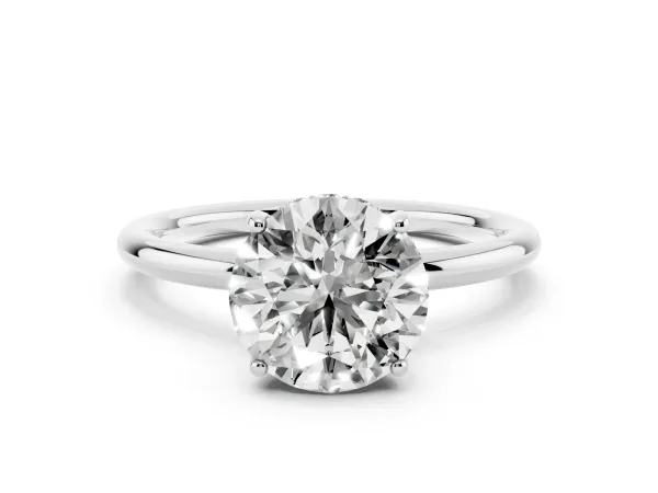 Round Cut Solitaire Diamond Ring with a Classic Band and Four-Prong Setting Platinum