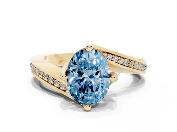 Fancy Blue Oval Cut Solitaire Diamond Twist Band with Pavé Setting and Four-Prong Setting Yellow gold