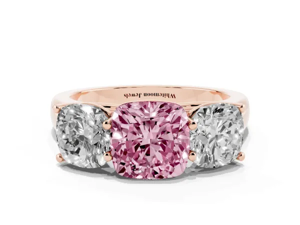 Fancy Pink Cushion Cut Three-Stone Diamond Ring with Prong Setting on a Classic Band Rose gold