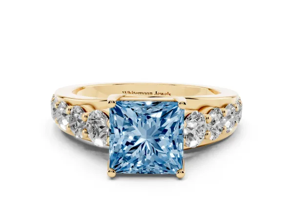 Fancy Blue Princess Cut Diamond Engagement Ring with Pavé Band and Four-Prong Setting Yellow gold
