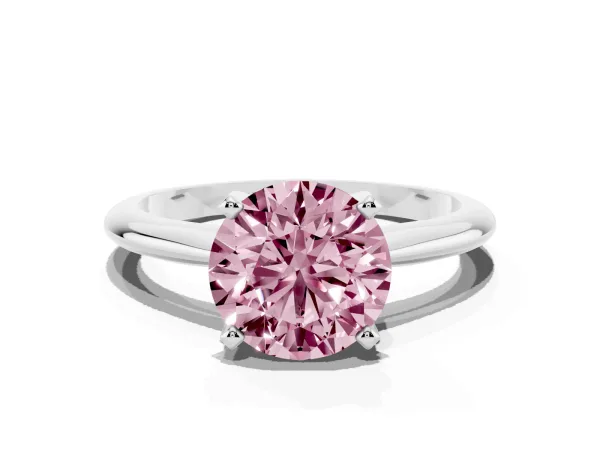 Fancy Pink Round Cut Cut Solitaire Ring with Four-Prong Setting on a Classic Band Platinum