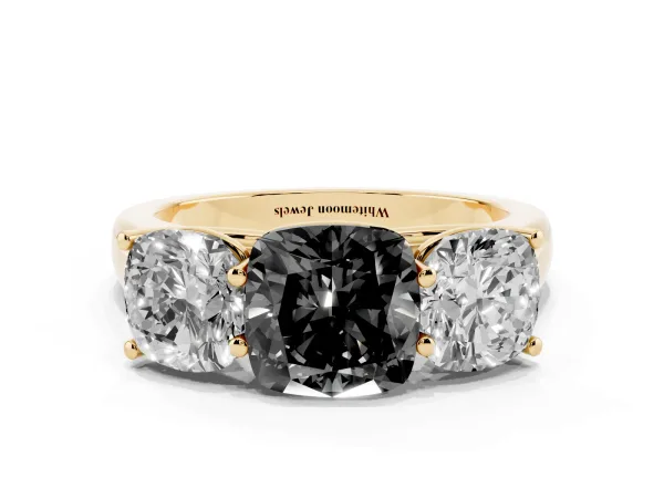 Fancy Black Cushion Cut Three-Stone Diamond Ring with Prong Setting on a Classic Band Yellow gold