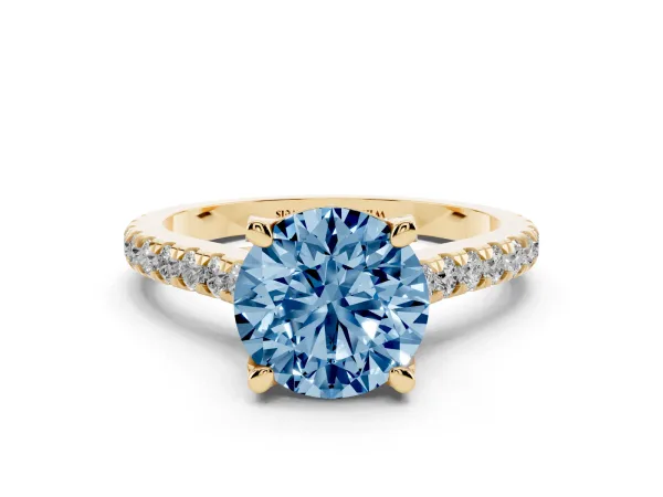 Fancy Blue Round Cut Brilliant Diamond Solitaire with Pavé Band and Four-Prong Setting Yellow gold