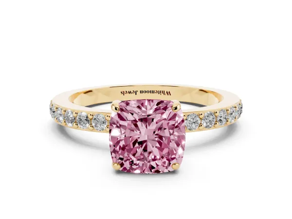 Fancy Pink Cushion Cut Diamond Pavé Engagement Ring with Round Accents and Prong Setting Yellow gold