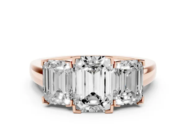 Three-Stone Emerald Cut Cut Diamond Ring with Channel Set Band and Four-Prong Setting Rose gold