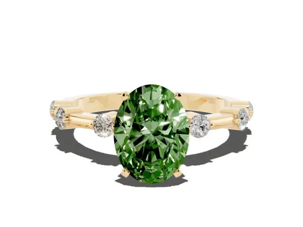 Fancy Green Oval Cut Solitaire Diamond Ring with Bezel Set Side Stones and Prong Setting Yellow gold