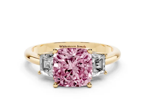 Fancy Pink Cushion Cut Diamond Three-Stone Ring with Trapezoid Side Stones and Prong Setting Yellow gold