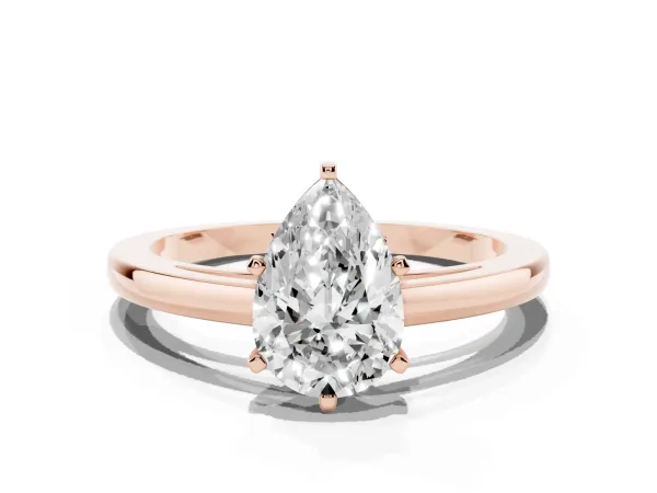 Pear Cut Solitaire Diamond Engagement Ring with Four-Prong Setting on a Classic Band Rose gold