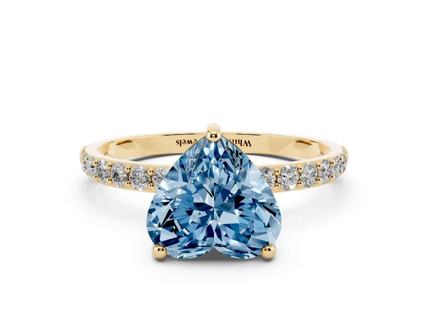 Fancy Blue Heart Cut Diamond Solitaire Ring with Round Pavé Band and Prong Setting Yellow gold