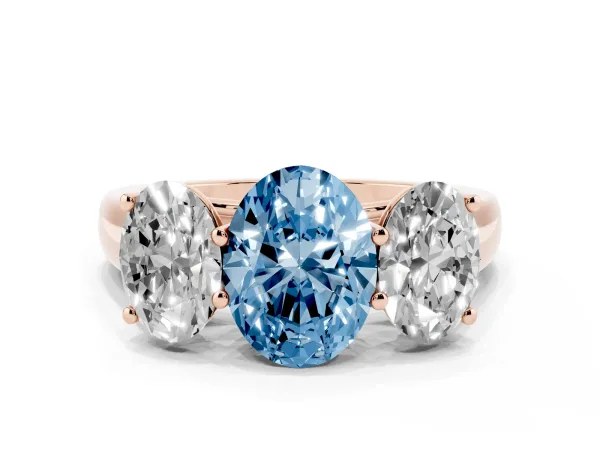 Fancy Blue Oval Cut Three-Stone Diamond Ring with Prong Setting on a Classic Band Rose gold