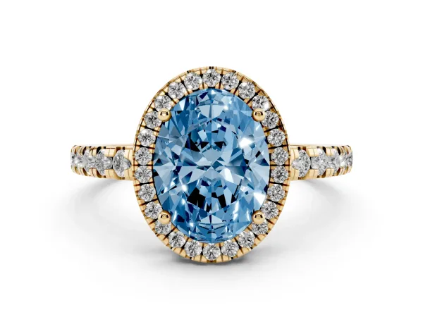 Fancy Blue Oval Cut Diamond Halo Ring with Pavé Band and Four-Prong Setting Yellow gold