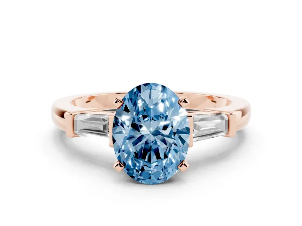 Fancy Blue Oval Cut Cut Diamond Solitaire Ring with Tapered Baguette Accents and Four-Prong Setting Rose gold