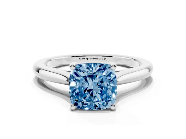 Fancy Blue Cushion Cut Cut Solitaire Ring with Cathedral Band and Four-Prong Setting White gold