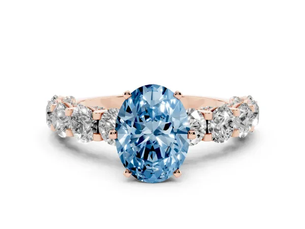 Fancy Blue Oval Cut Diamond Side Stone Engagement Ring with Four-Prong Setting Rose gold
