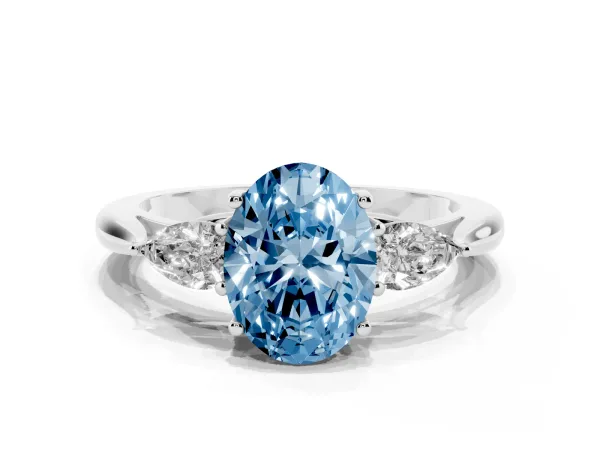 Fancy Blue Three-Stone Oval Cut Diamond Ring with Pear Side Stones in Four-Prong Setting White gold