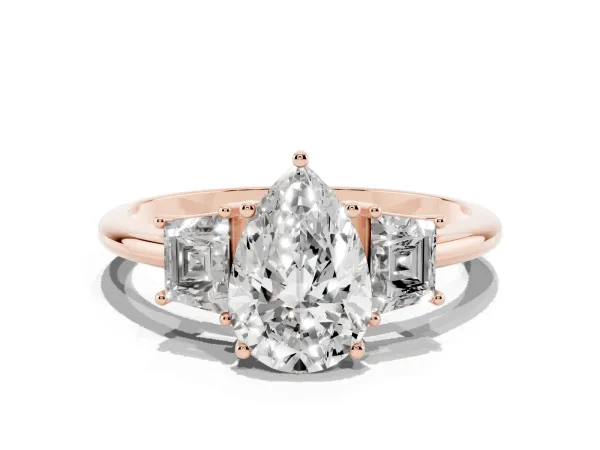Pear Cut Diamond Three-Stone Ring with Trapezoid Side Stones and Prong Setting Rose gold