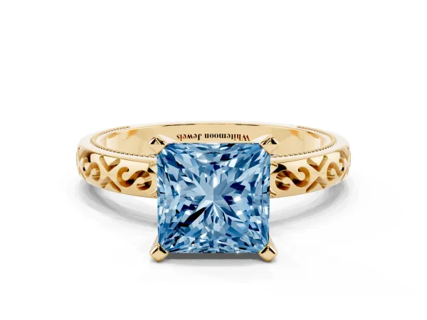 Fancy Blue Princess Cut Solitaire Engagement Ring with Scrollwork Band and Four-Prong Setting Yellow gold