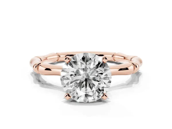 Round Cut Solitaire Diamond Ring with Bamboo Band and Four-Prong Setting Rose gold