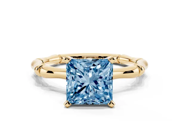 Fancy Blue Princess Cut Solitaire Diamond Ring with Bamboo Band and Four-Prong Setting Yellow gold