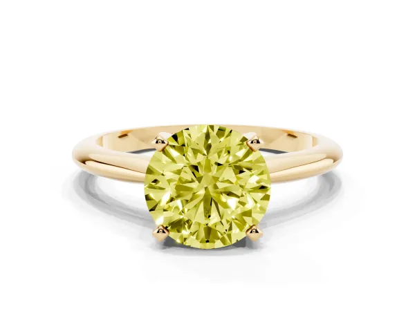 Fancy Yellow Round Cut Cut Solitaire Ring with Four-Prong Setting on a Classic Band Yellow gold
