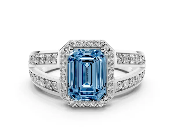 Fancy Blue Emerald Cut Diamond Halo Ring with Split Shank Pavé Band and Four-Prong Setting Platinum