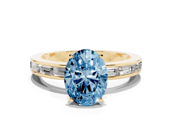 Fancy Blue Oval Cut Solitaire Diamond Ring with Channel-Set Baguette Band and Four-Prong Setting Yellow gold