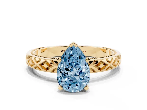 Fancy Blue Pear Cut Solitaire Diamond Ring with Milgrain and Black Enamel X Pattern Band Yellow gold