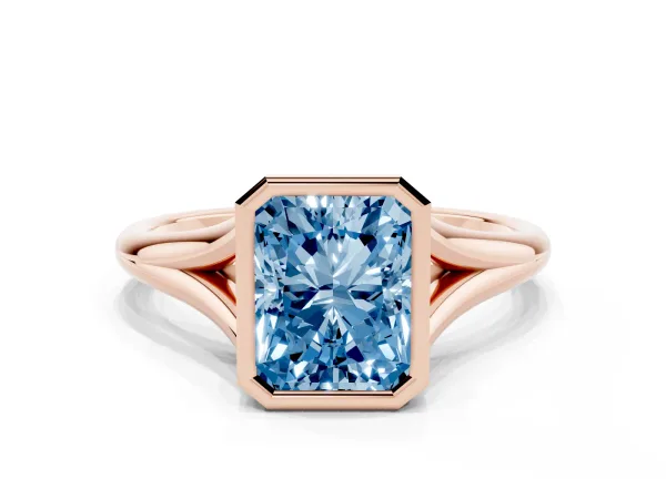 Fancy Blue Bezel Set Radiant Cut Cut Solitaire Ring with Tapered Band Rose gold