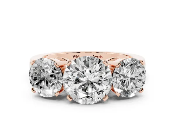 Three-Stone Round Cut Cut Diamond Ring with Channel Set Band and Four-Prong Setting Rose gold