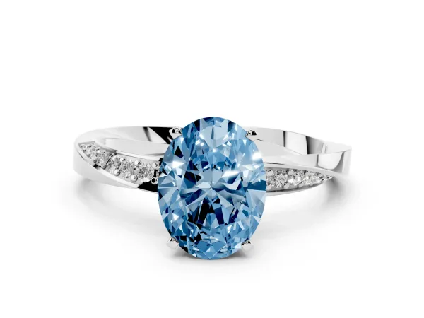 Fancy Blue Oval Cut Diamond Engagement Ring with Side Stone Accents and Four-Prong Setting Platinum