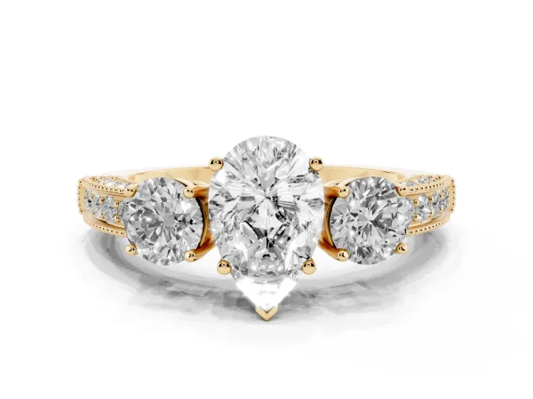 Pear Cut Three-Stone Diamond Ring with Pavé Band and Four-Prong Setting Yellow gold