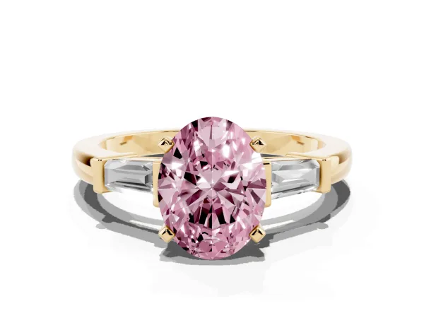 Fancy Pink Oval Cut Cut Diamond Solitaire Ring with Tapered Baguette Accents and Four-Prong Setting Yellow gold