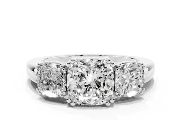 Three-Stone Cushion Cut Cut Diamond Ring with Channel Set Band and Four-Prong Setting Platinum