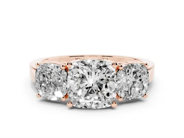Three-Stone Cushion Cut Cut Diamond Engagement Ring with Flat Band and Four-Prong Setting Rose gold
